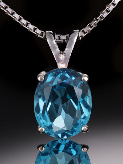 12x10mm Oval Blue Topaz Pendant with Chain